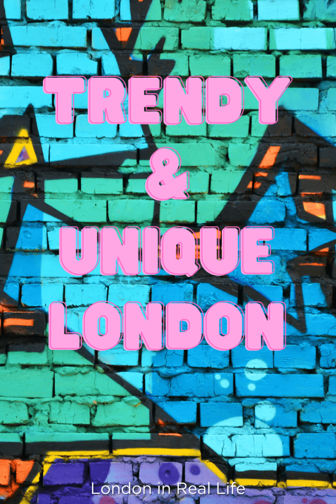 Quiz result graphic for London in Real Life's "Where To Stay in London Quiz". Image of a graffiti art wall in Shoreditch with pink bubble text overlaid: "Trendy & Unique London."